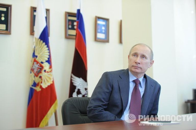 Премьер-министр РФ В.Путин посетил ФМС РФ