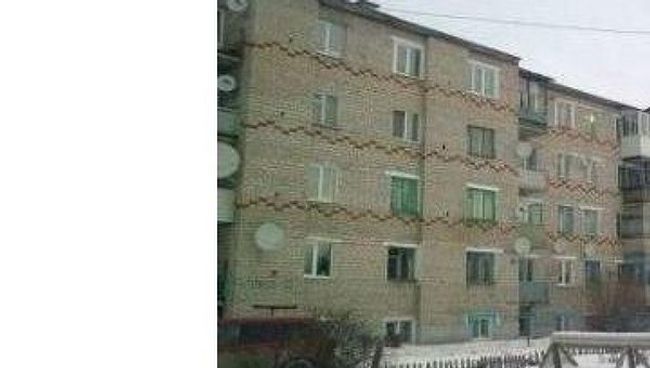 Дом в селе Моховое Кунгурского района в Пермском крае, где произошел пожар Дом в селе Моховое Кунгурского района в Пермском крае, где произошел пожар