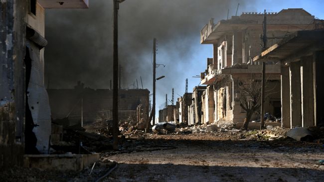 Разрушенные дома в населенном пункте ад-Дейр аш-Шаркий в Сирии на юго-востоке провинции Идлиб