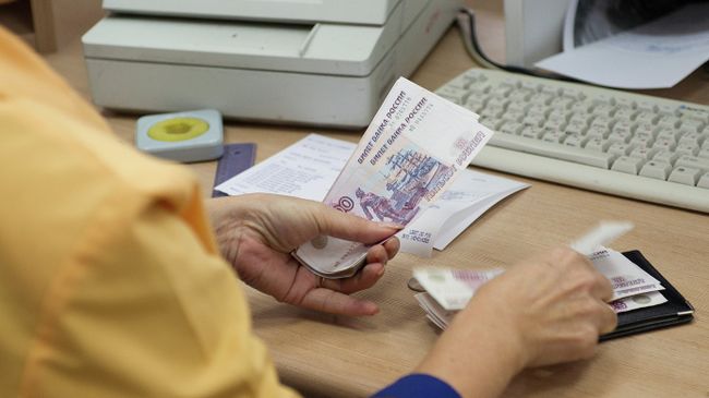 Выдача пенсий в одном из отделений Почты России. Архивное фото Выдача пенсий в одном из отделений Почты России. Архивное фото