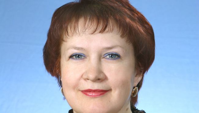 Елена Ушакова, учитель  истории и английского языка Поросинской средней общеобразовательной школы. Томская область. Архивное фото