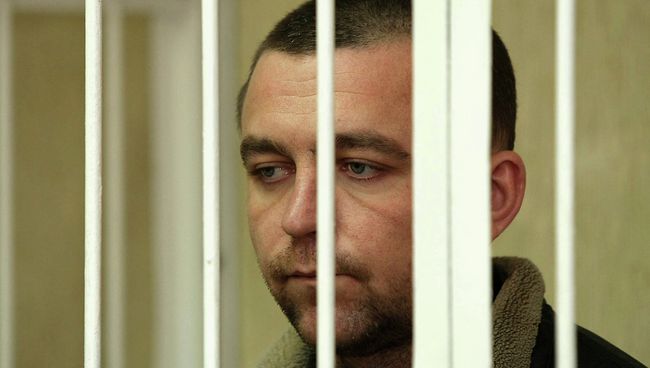 Экс-инспектор ДПС Алексея Мозго во время судебного заседания, архивное фото