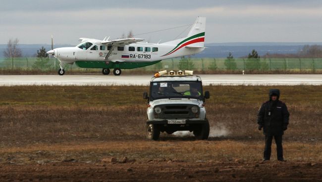 Специалисты выровняли воронку на месте крушения самолета Boeing 737 в Казани. Архивное фото Специалисты выровняли воронку на месте крушения самолета Boeing 737 в Казани. Архивное фото