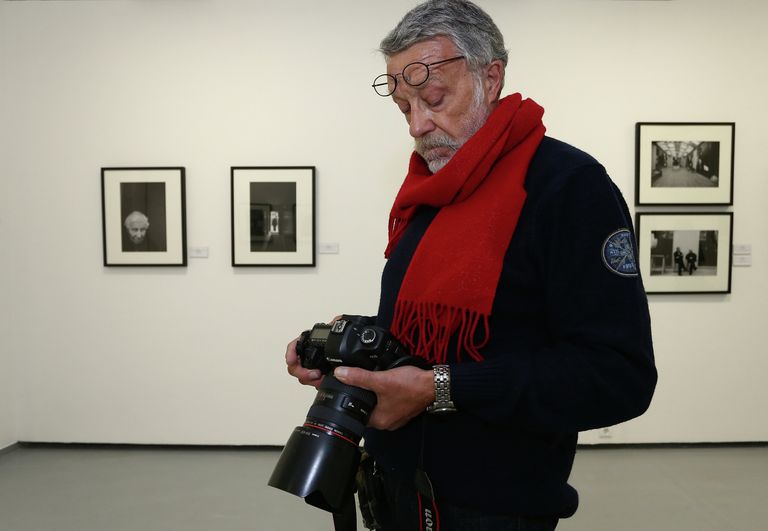 Фотограф, журналист Юрий Рост на своей фотовыставке Фотограф, журналист Юрий Рост на своей фотовыставке