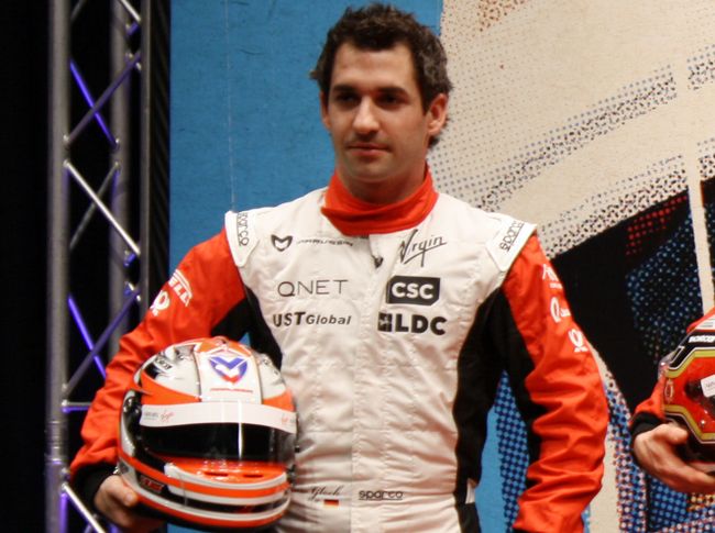 Пилот команды Marussia Virgin Racing Тимо Глок Пилот команды Marussia Virgin Racing Тимо Глок
