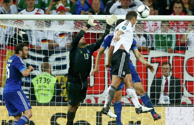Miroslav Klose scores a goal Miroslav Klose scores a goal