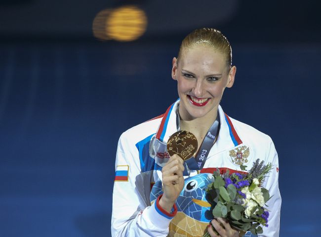 Светлана Ромашина с золотой медалью чемпионата мира Светлана Ромашина с золотой медалью чемпионата мира