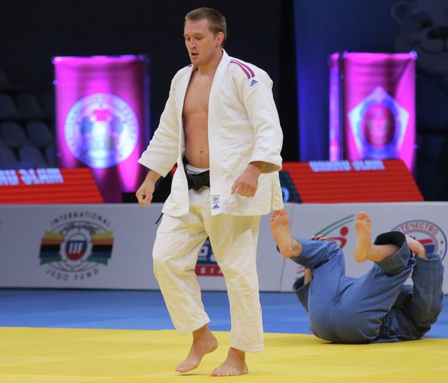 Российский спортсмен Иван Воробьев (в белой форме) Российский спортсмен Иван Воробьев (в белой форме)