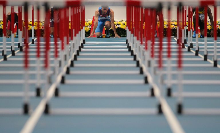 Российский спортсмен Сергей Шубенков в финальном забеге на 110 м с барьерами среди мужчин Российский спортсмен Сергей Шубенков в финальном забеге на 110 м с барьерами среди мужчин