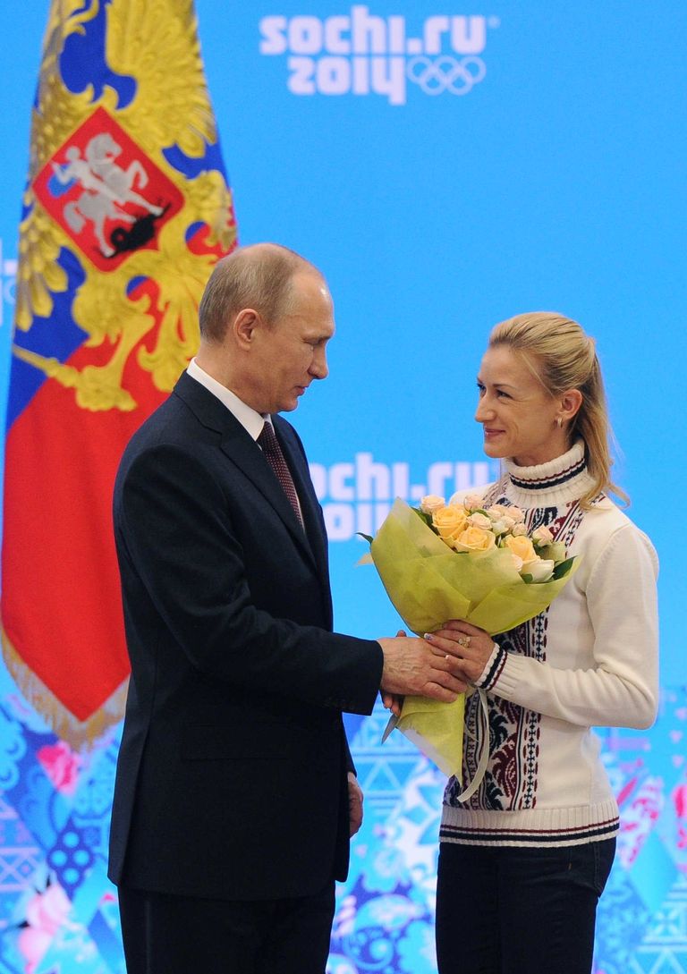 Президент России Владимир Путин и двукратная олимпийская чемпионка в фигурном катании Татьяна Волосожар Президент России Владимир Путин и двукратная олимпийская чемпионка в фигурном катании Татьяна Волосожар