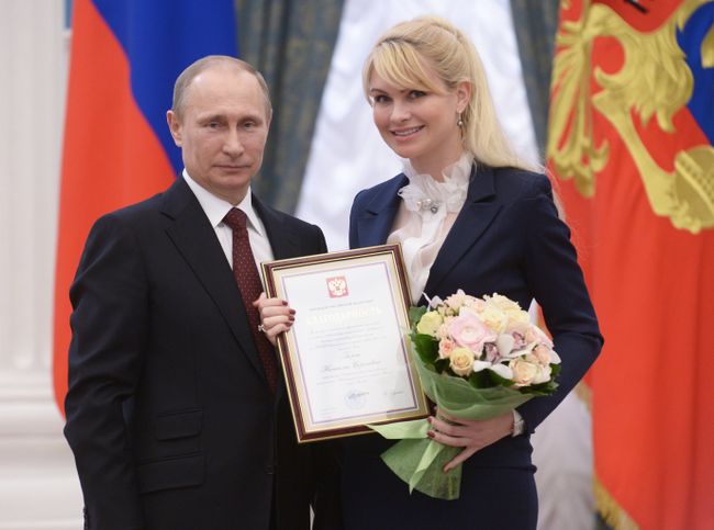 Президент России Владимир Путин и президент Федерации санного спорта России Наталия Гарт Президент России Владимир Путин и президент Федерации санного спорта России Наталия Гарт