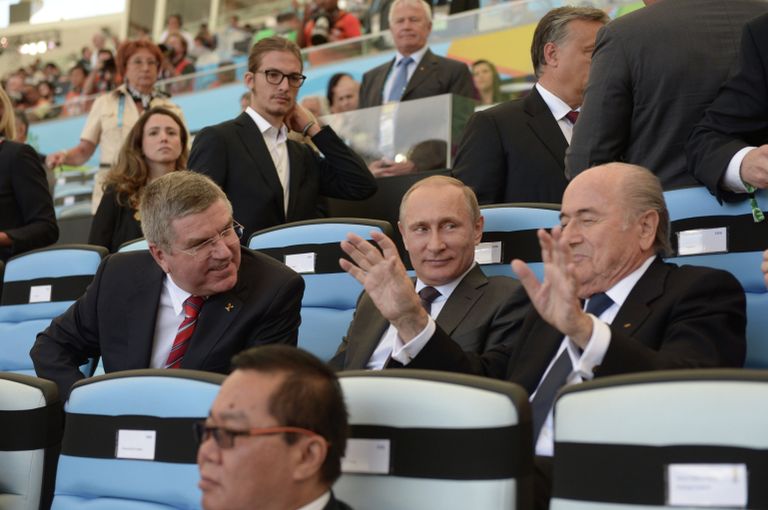 Президент России Владимир Путин (в центре) во время торжественной церемонии закрытия чемпионата мира Президент России Владимир Путин (в центре) во время торжественной церемонии закрытия чемпионата мира