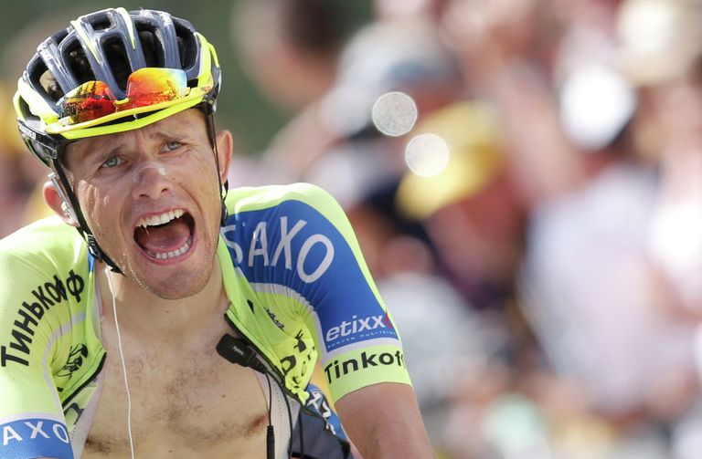 Велогонщик Tinkoff-Saxo Рафал Майка на финише четырнадцатого этапа Тур де Франс Велогонщик Tinkoff-Saxo Рафал Майка на финише четырнадцатого этапа Тур де Франс